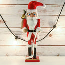 Christmas Gift Santa Nutcracker – Red and White Wooden Nutcracker Santa Man in Traditional Santa Attire with a Bag of Gold Wrapped Gifts Over His Shoulder and a List of Names in Hand Xmas Themed Holiday Nut Cracker Doll Figure Decorations