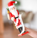 Christmas Gift Santa Nutcracker – Red and White Wooden Nutcracker Santa Man in Traditional Santa Attire with a Bag of Gold Wrapped Gifts Over His Shoulder and a List of Names in Hand Xmas Themed Holiday Nut Cracker Doll Figure Decorations
